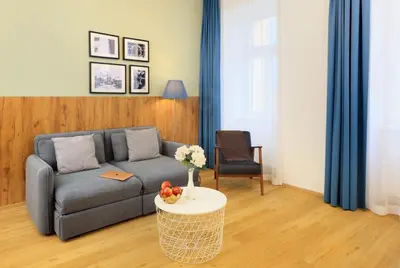 Ein Sitzbereich in der Unterkunft Jimmy's Apartments Dandelion