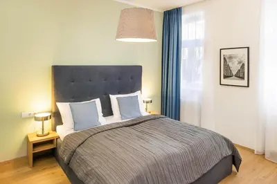 Ein Bett oder Betten in einem Zimmer der Unterkunft Jimmy's Apartments Dandelion