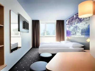 Ein Bett oder Betten in einem Zimmer der Unterkunft B&B Hotel Wien-Stadthalle