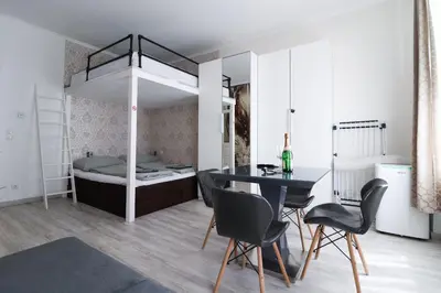 Ein Bett oder Betten in einem Zimmer der Unterkunft CozyNite Premium Apartment Favoriten