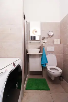 Ein Badezimmer in der Unterkunft CozyNite Premium Apartment Favoriten