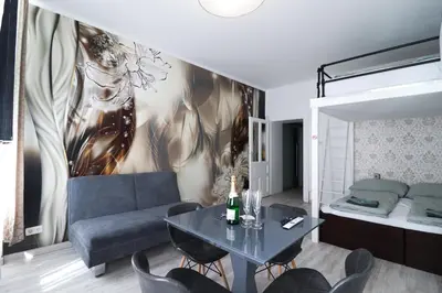 Ein Sitzbereich in der Unterkunft CozyNite Premium Apartment Favoriten