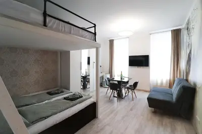 Ein Bett oder Betten in einem Zimmer der Unterkunft CozyNite Premium Apartment Favoriten