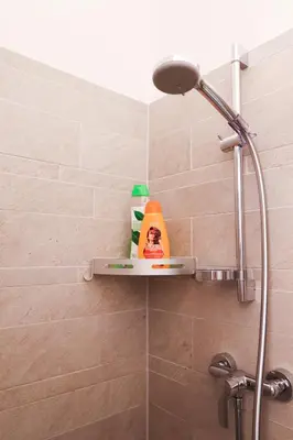Ein Badezimmer in der Unterkunft CozyNite Premium Apartment Favoriten