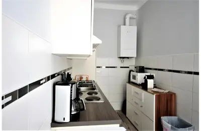 Küche/Küchenzeile in der Unterkunft Modern flat with 2 rooms, close to Schönbrunn
