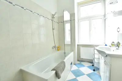 Ein Badezimmer in der Unterkunft UNIVERSUM APARTMENT 3