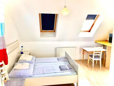 Ein Bett oder Betten in einem Zimmer der Unterkunft Gästezimmer Puzwidu