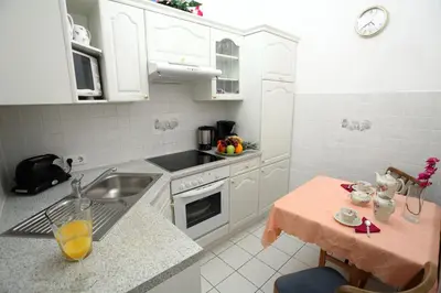 Küche/Küchenzeile in der Unterkunft Mozart Apartments - Rögergasse