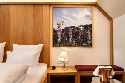Ein Bett oder Betten in einem Zimmer der Unterkunft Flora auf Gut Guntrams