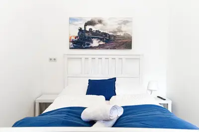 Ein Bett oder Betten in einem Zimmer der Unterkunft Pleasant 3 private rooms in shared Apartment- Ideal for short & Longstays