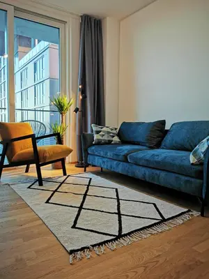 Ein Sitzbereich in der Unterkunft My TrIIIple Ferienwohnung zwischen City und Prater