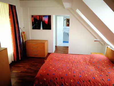 Ein Bett oder Betten in einem Zimmer der Unterkunft Schlossquadrat Apartment 16