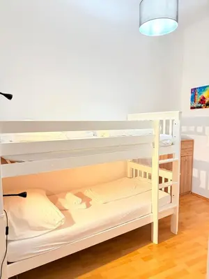 Ein Bett oder Betten in einem Zimmer der Unterkunft Gesamte Unterkunft für 4 Personen Top 8