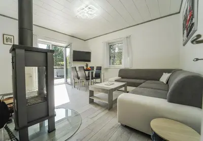 TV/Unterhaltungsangebot in der Unterkunft Behagliches Cottage mit Kamin mitten im Wald