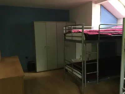 Ein Bett oder Betten in einem Zimmer der Unterkunft Suburb Hostel
