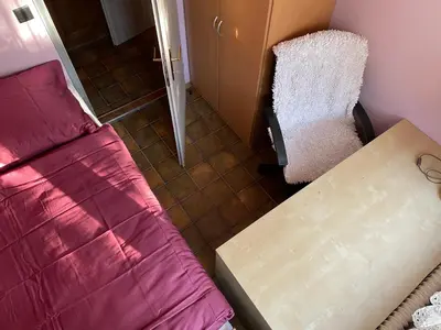 Ein Bett oder Betten in einem Zimmer der Unterkunft Suburb Hostel
