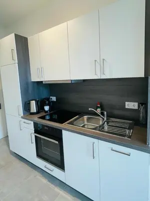 Küche/Küchenzeile in der Unterkunft K City Apartments Märzstraße
