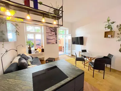 Ein Sitzbereich in der Unterkunft Thalia Garden Suites - 8 min to city center
