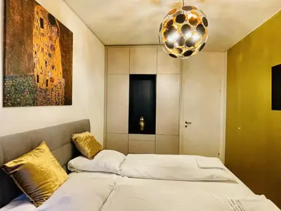 Ein Bett oder Betten in einem Zimmer der Unterkunft Royal Swan Skyline, Wien