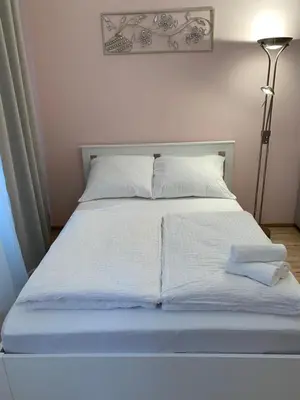 Ein Bett oder Betten in einem Zimmer der Unterkunft Prater Zentrum