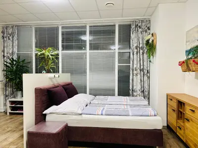 Ein Bett oder Betten in einem Zimmer der Unterkunft Ferienzimmer Seepark
