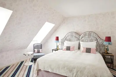 Ein Bett oder Betten in einem Zimmer der Unterkunft The Leo Grand