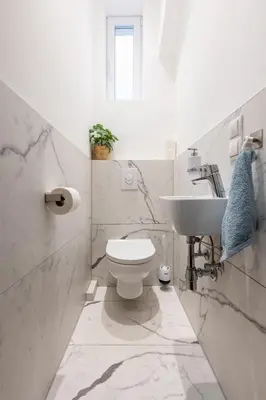 Ein Badezimmer in der Unterkunft Cozy Apartment, 2 Private terraces, 8 min to city center