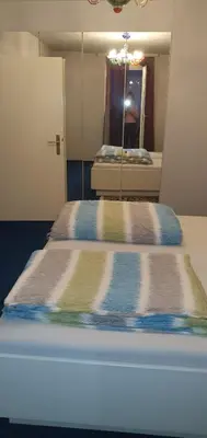 Ein Bett oder Betten in einem Zimmer der Unterkunft Wohnung in Zentrumsnähe beim Hauptbahnhof (100 m2)