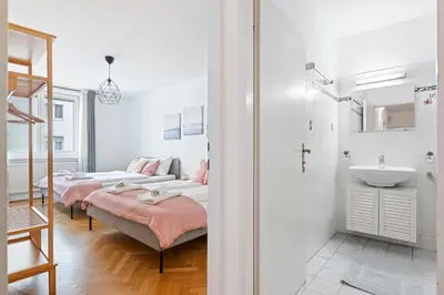 Ein Bett oder Betten in einem Zimmer der Unterkunft 2 BR City Apartment in Neubau, 6 min to city center
