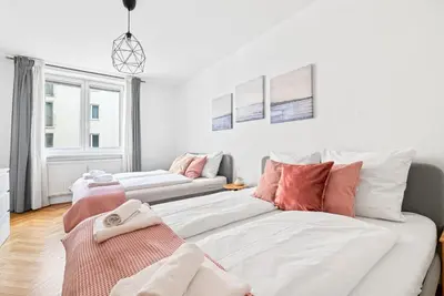 Ein Bett oder Betten in einem Zimmer der Unterkunft 2 BR City Apartment in Neubau, 6 min to city center