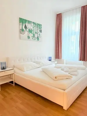 Ein Bett oder Betten in einem Zimmer der Unterkunft Gesamte Unterkunft für 6 Personen