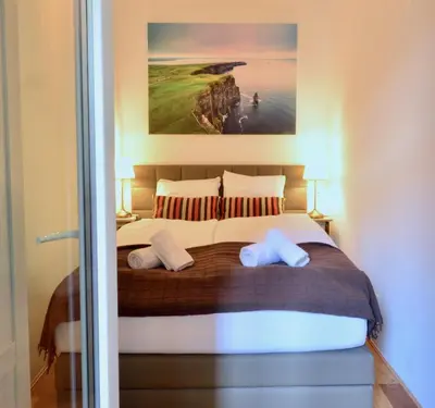 Ein Bett oder Betten in einem Zimmer der Unterkunft L&G's Apartment - Balcony - Close to Car Park