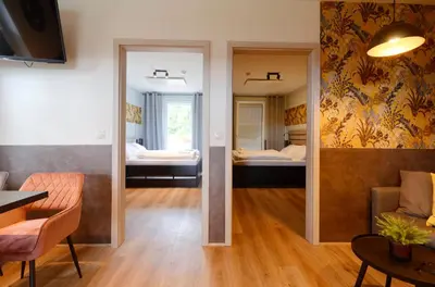 Ein Bett oder Betten in einem Zimmer der Unterkunft MH Apartments