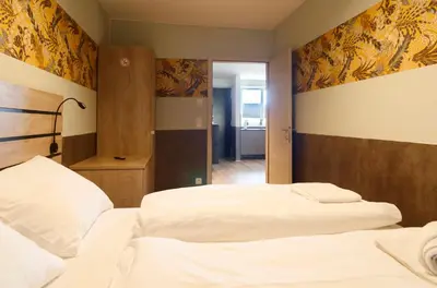 Ein Bett oder Betten in einem Zimmer der Unterkunft MH Apartments
