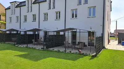 Ein Garten an der Unterkunft MH Apartments