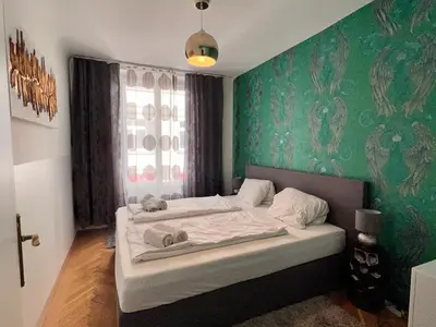 Ein Bett oder Betten in einem Zimmer der Unterkunft Exclusive Apartment Center Vienna
