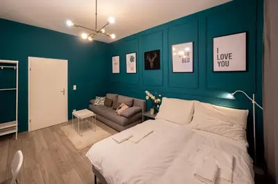 Ein Bett oder Betten in einem Zimmer der Unterkunft Radiant Premium Apartments-Muhrengasse