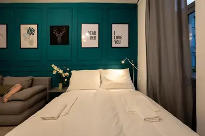 Ein Bett oder Betten in einem Zimmer der Unterkunft Radiant Premium Apartments-Muhrengasse