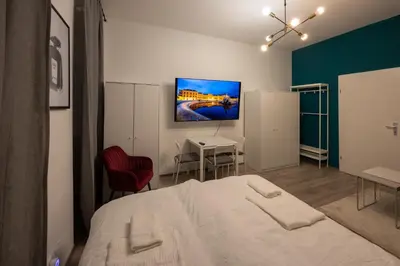 Ein Bett oder Betten in einem Zimmer der Unterkunft Radiant Premium Apartments-Muhrengasse