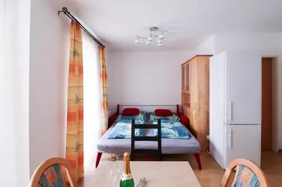 Ein Bett oder Betten in einem Zimmer der Unterkunft CozyNite Premium Apartment Schönbrunn 2