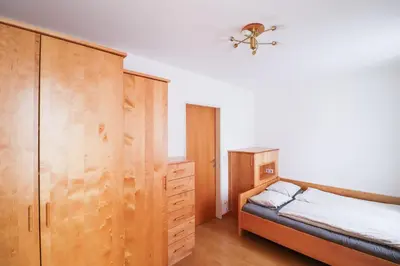 Ein Bett oder Betten in einem Zimmer der Unterkunft CozyNite Premium Apartment Schönbrunn 2