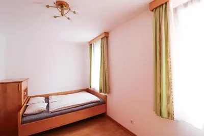 Ein Bett oder Betten in einem Zimmer der Unterkunft CozyNite Premium Apartment Schönbrunn 2