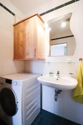 Ein Badezimmer in der Unterkunft CozyNite Premium Apartment Schönbrunn 2