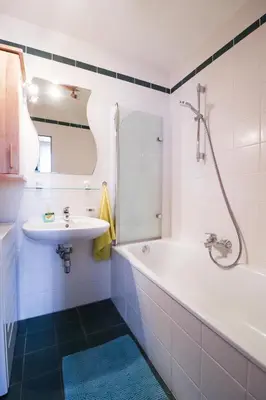 Ein Badezimmer in der Unterkunft CozyNite Premium Apartment Schönbrunn 2