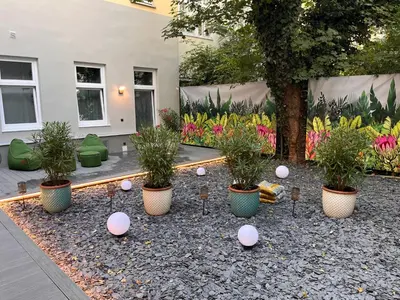 Ein Garten an der Unterkunft Street Living Hotel - Apartments