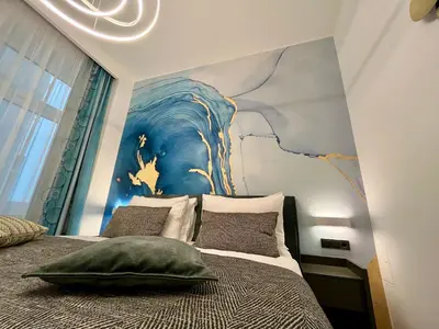 Ein Bett oder Betten in einem Zimmer der Unterkunft Street Living Hotel - Apartments