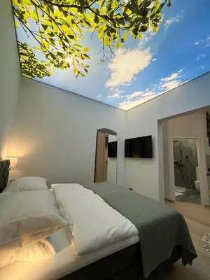 Ein Bett oder Betten in einem Zimmer der Unterkunft Street Living Hotel - Apartments