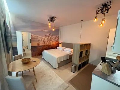 Ein Bett oder Betten in einem Zimmer der Unterkunft Street Living Hotel - Apartments