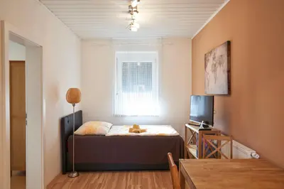 Ein Bett oder Betten in einem Zimmer der Unterkunft Gästezimmer Victoria