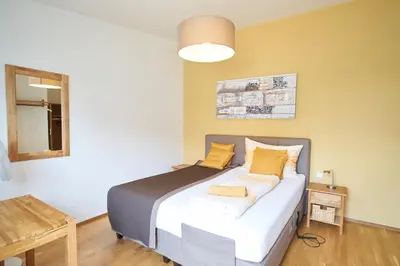 Ein Bett oder Betten in einem Zimmer der Unterkunft Gästezimmer Victoria